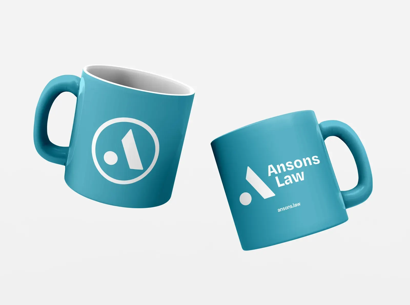 Two teal mugs carrying the Ansons Law mark and wordmark.
