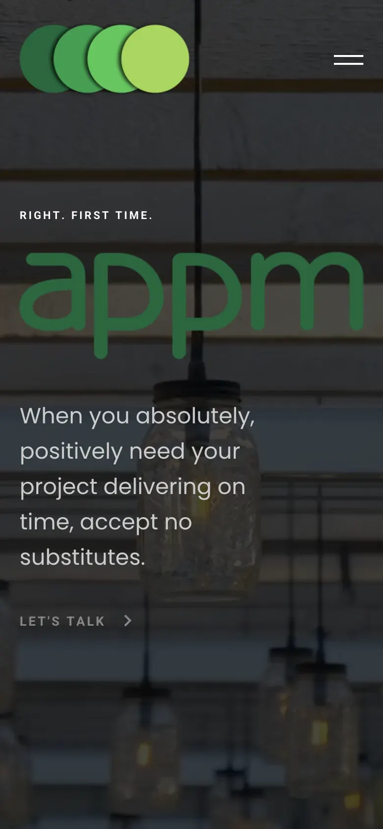 The APPM homepage on a phone, with the four circles, Right. First Time. and the appm wordmark in green over a dark photo of hanging lights.