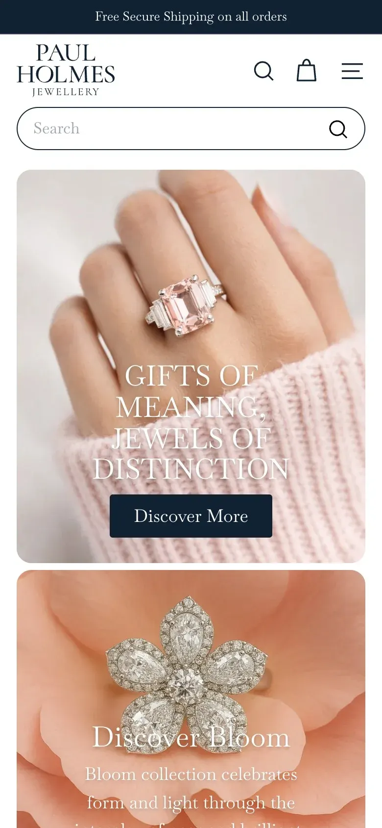 The Paul Holmes Jewellery homepage on a phone, with the navy and serif wordmark above a ring photograph.